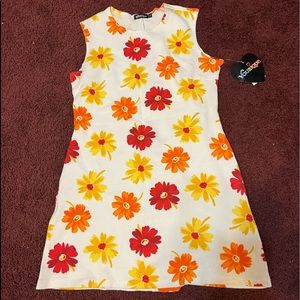 Girls Younique beautiful floral dress size large ! NWT